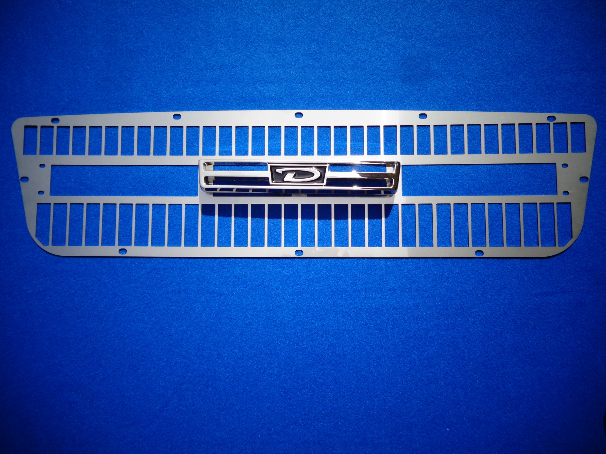 Datsun Roadster 2000 67 1/2, 68, 69 & 70 Polished Stainless Steel Grill back w/ Grill Emblem