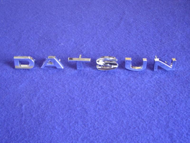 Datsun Roadster 65, 66, 67, 671/2, 68, 69 & 70 Metal Hood Emblem Set